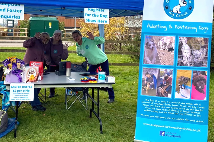 Volunteers at a One Paw fundraising stall